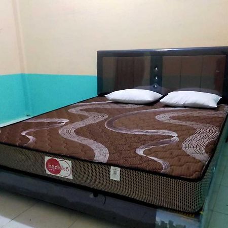 Express O 91938 Grace Kost & Hostel Tiga Binanga 外观 照片